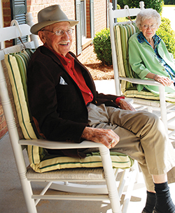 gentleman in rocking chair on front porch